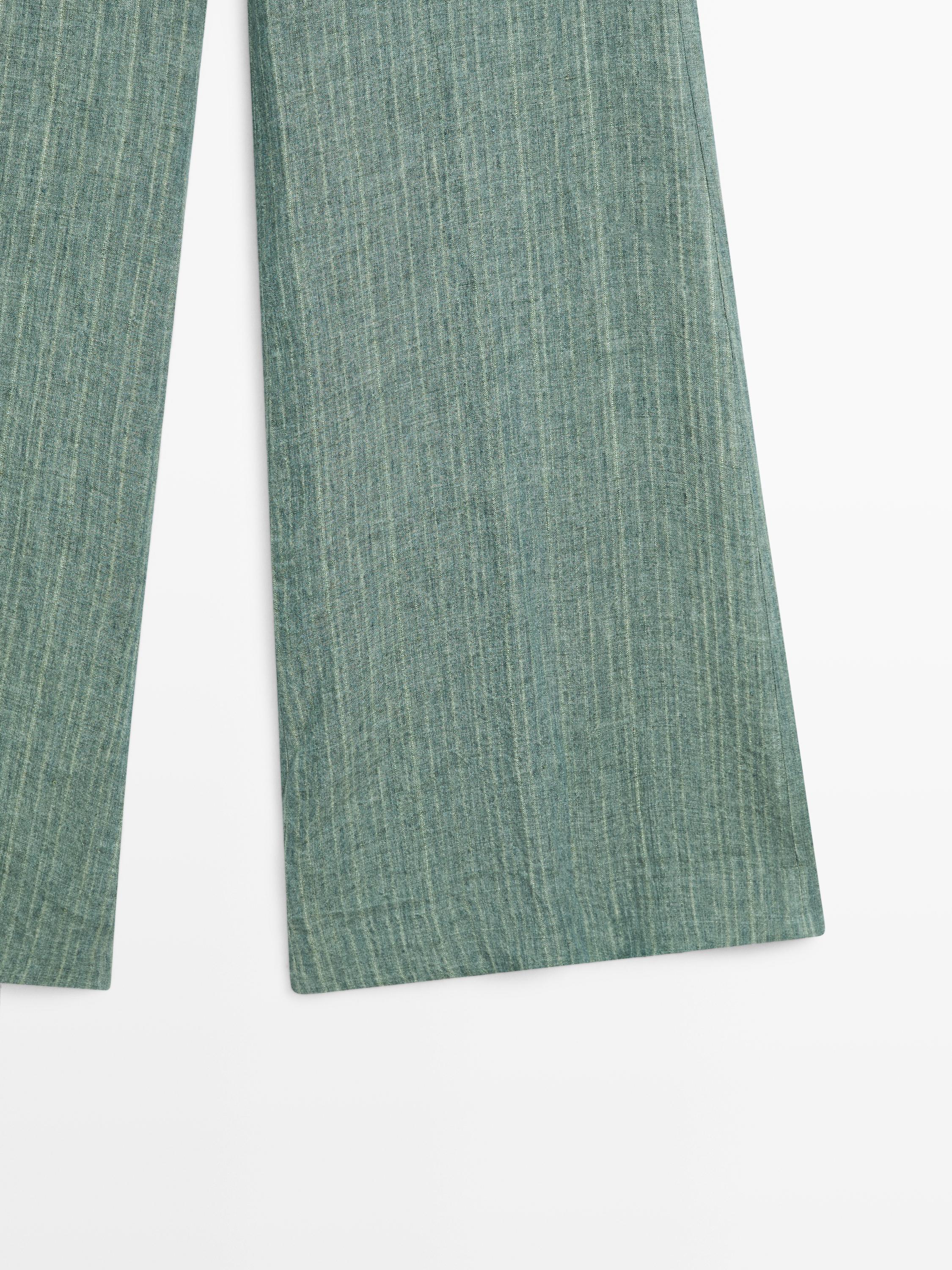 Striped flowing trousers with corset belt detail